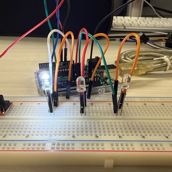 Julie and I wanted to explore the Arduino and pressure sensor further. We brainstormed ways to visually indicate different air pressure levels and decided to use LED lights. This setup provides real-time feedback, with each LED lighting up according to the pressure detected by the sensor.